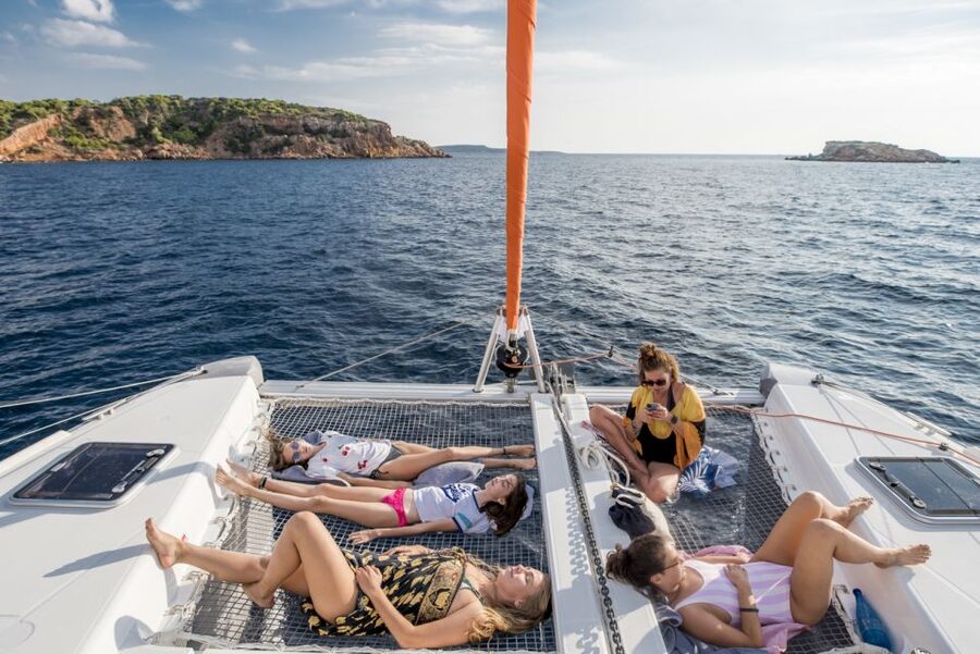Athens: Half-Day Sunset Catamaran Cruise with Meal & Drinks - Crew hospitality and the small-group atmosphere