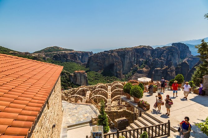 Athens: Meteora Monasteries, Hermit Caves Tour with Pickup - Kalambaka, dinner stops, and the return to Athens