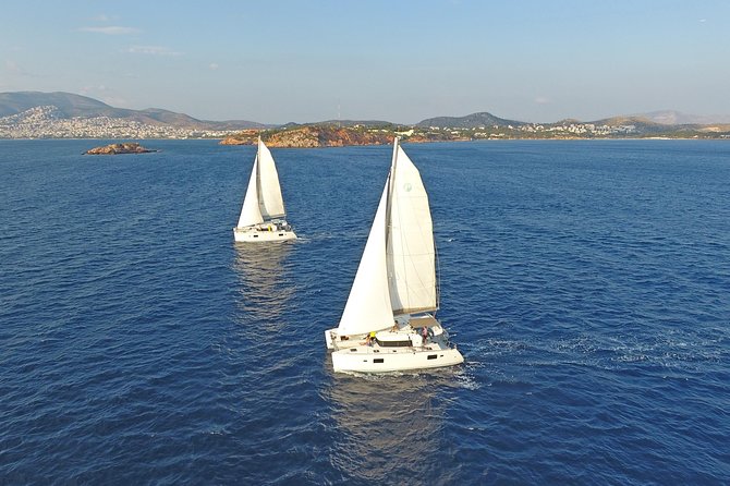 Athens Private Luxury Catamaran Cruise with Traditional Greek Meal and BBQ - Two swim stops, with towels and goggles ready