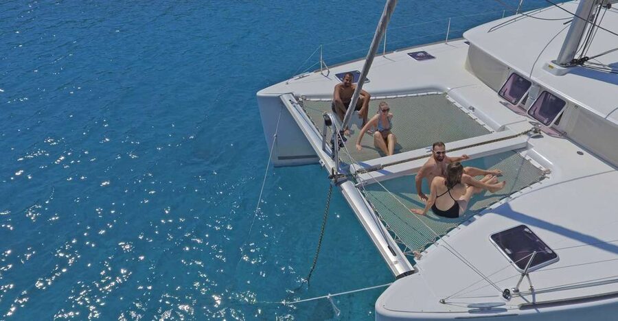 Athens: Riviera Catamaran Cruise with Meal and Drinks - Room to relax on a ten-person boat