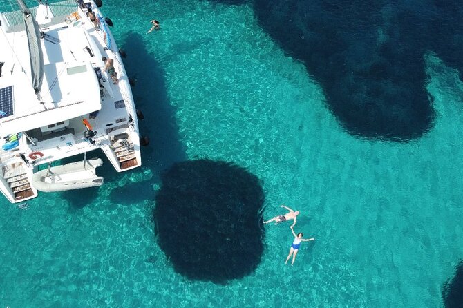 Athens Riviera Catamaran tour with fresh Meal Drinks and Swimming - Greek lunch, made and served on board