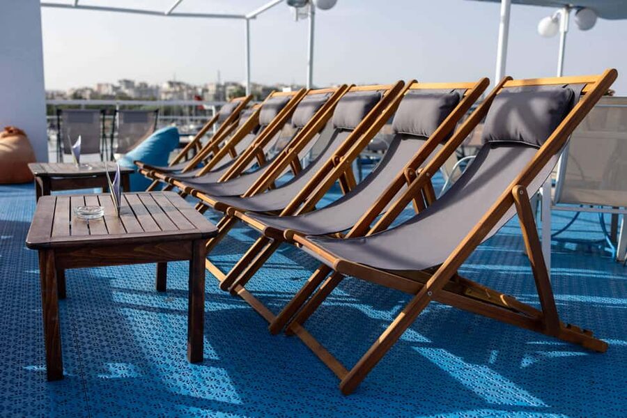 Athens: Swimming Cruise with Lunch, Wine & Live DJ on Board - Metopi: a short swim in the middle of the sea