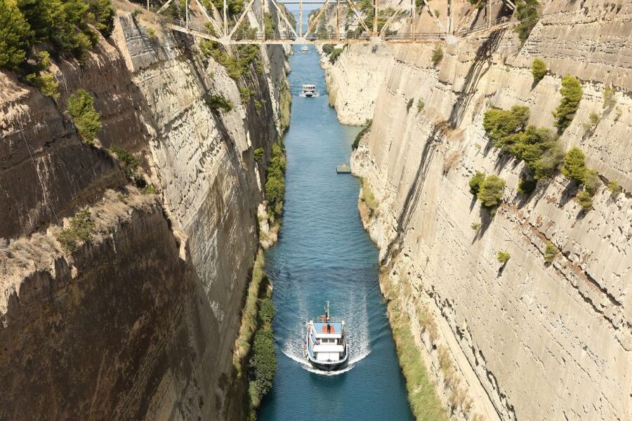 From Athens: Ancient Corinth Day Trip with Canal & VR Guide - A canal cut through solid rock