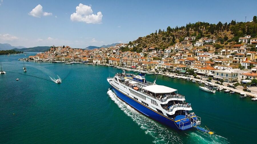 From Athens: Saronic Islands Full-Day Cruise with VIP Seats - Poros: pine slopes, white lanes and the clock tower